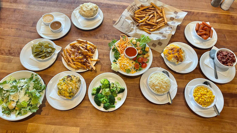 Scratch sides station with corn, slaw, and beans